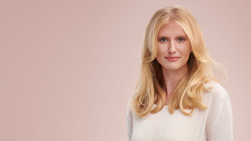 Model wearing a retro blow out style